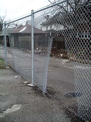 Damaged fences make it easy for vandals to escape