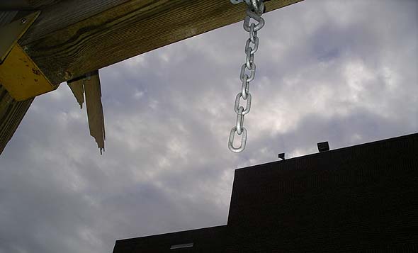 Removed swings, structural damage